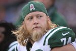 ORCHARD PARK, NY - NOVEMBER 17: Nick Mangold #74 of the New York Jets looks on from the bench during NFL game action against the Buffalo Bills at Ralph Wilson Stadium on November 17, 2013 in Orchard Park, New York. (Photo by Tom Szczerbowski/Getty Images)